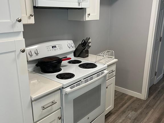 Range/oven, microwave included! Fridge location.