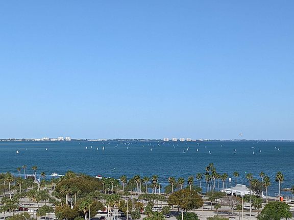 Living Room and Dining Room View Of Sarasota Bay