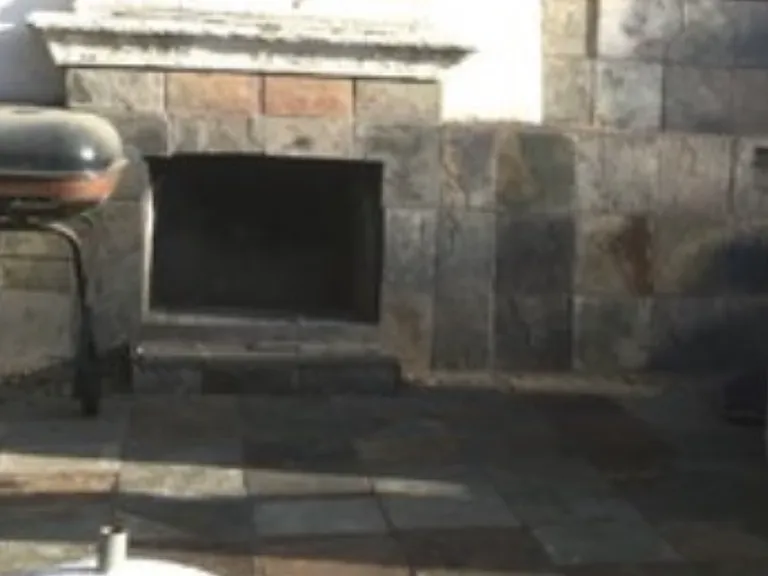 Outside patio fireplace and grill