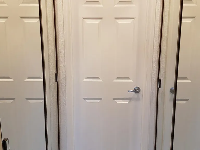 Master BR Dual Closets w Mirrored Doors