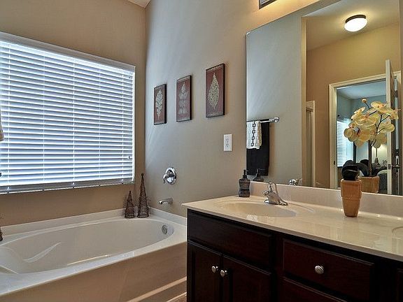 Master bath with two sinks, garden tub and separate shower.