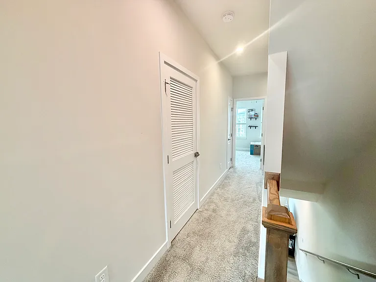 2nd floor hallway with laundry (washer/dryer)
