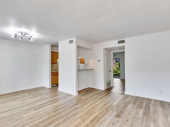 Open main living area, new chandelier installed 10/2024