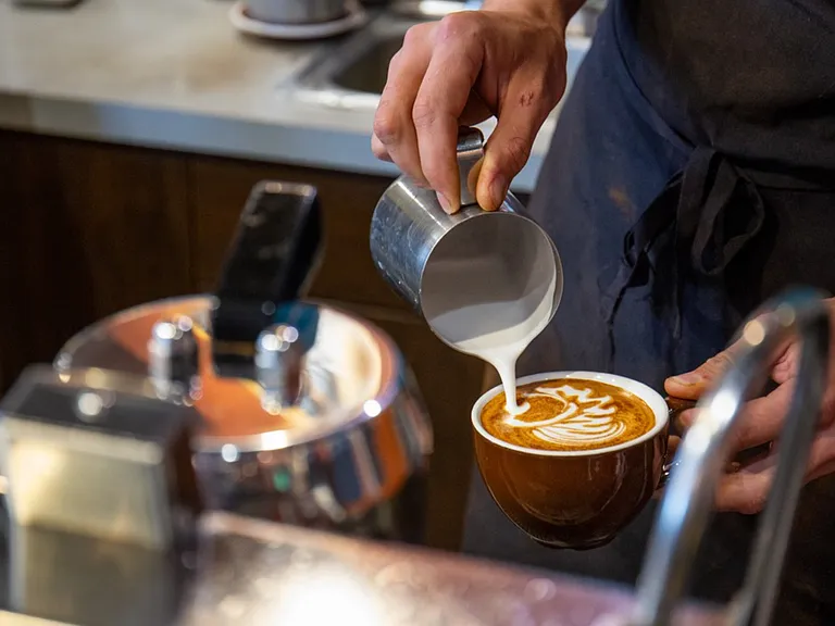 Grab your morning coffee from Ozo, only a 5-minute walk away
