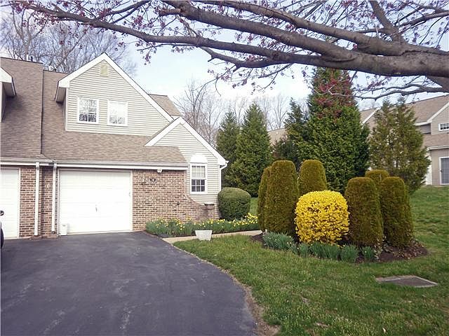 End townhome with garage on landscaped lot