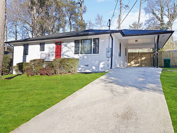 Red door, NEW roof, NEW windows, NEW appliances