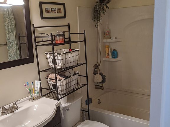 Bathroom with tiled floor & brushed nickel fixtures