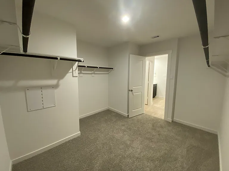 Large walk-in closet in master bedroom