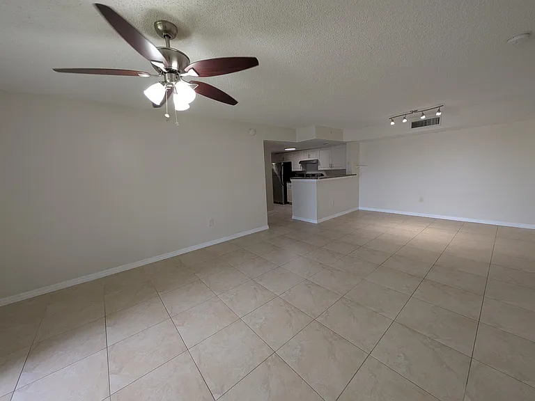 5011 Wiles Rd #208 — Photo 4