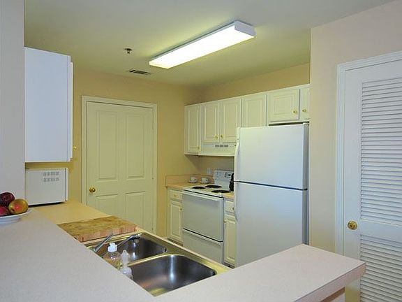 Plenty of counter and cabinet space. Plus there is a pantry/ laundry room 