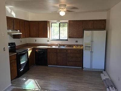 freshly painted kitchen with new floor