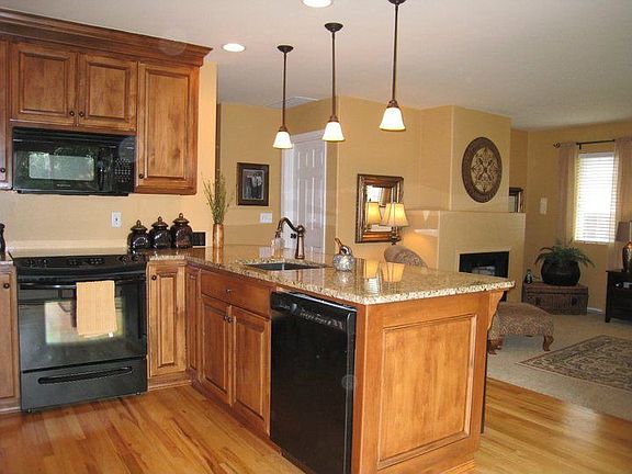 Custom kitchen with hardwood floors, total remodel in 2008