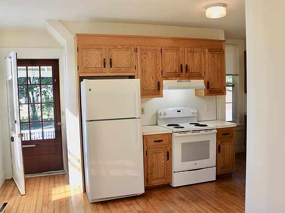 Kitchen with door to porch area