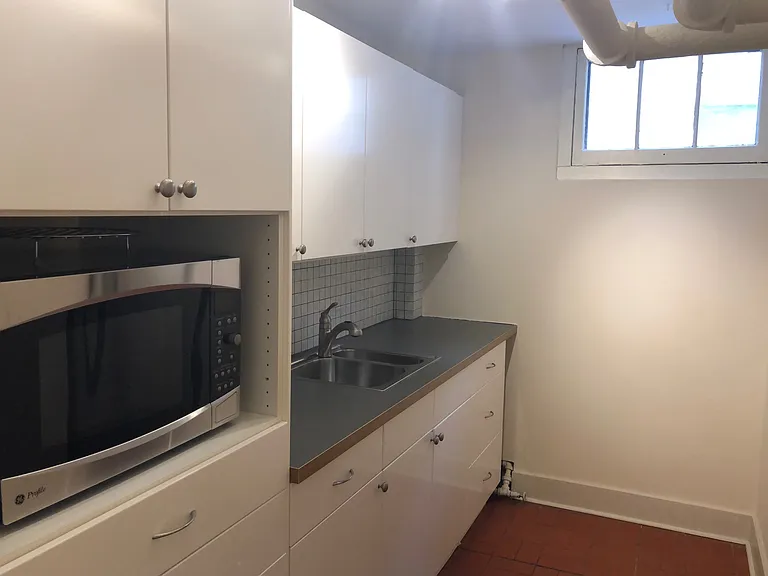 Modern kitchen with ample storage space.