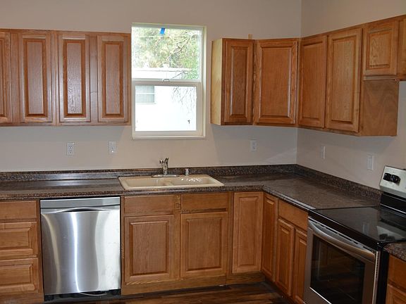 New cabinets, and appliances, and enough room on the opposite wall to "eat in"