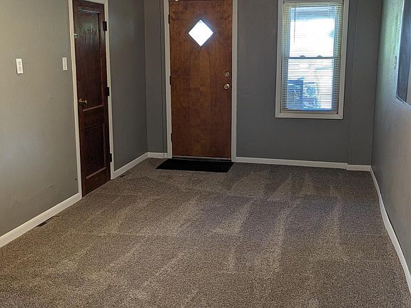 Living room looking at front entry door