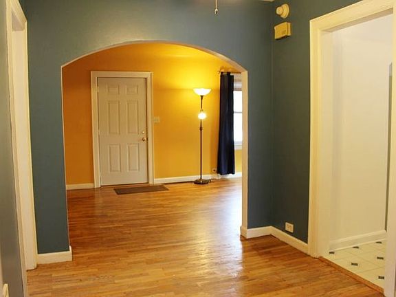 The dining room is open to the living room and kitchen.