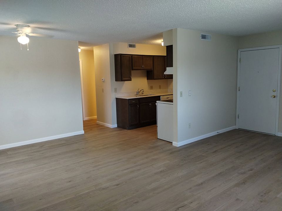 VIEW FROM LIVING ROOM TO KITCHEN & DINING AREA