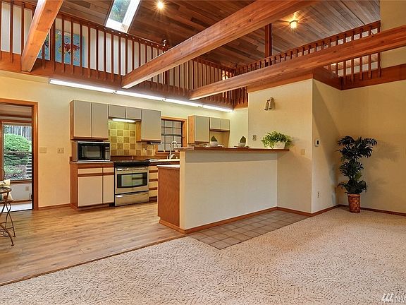 Love these wood beams!  The skylights above let in the natural light.