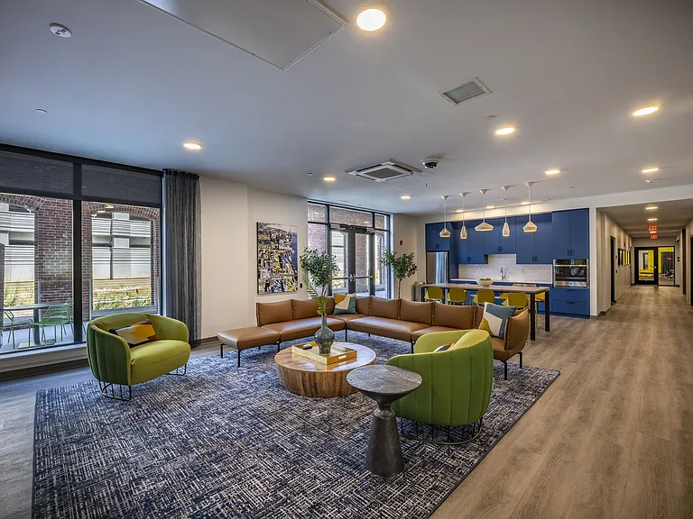Resident Lounge - Seating Area With Chairs And Couch.