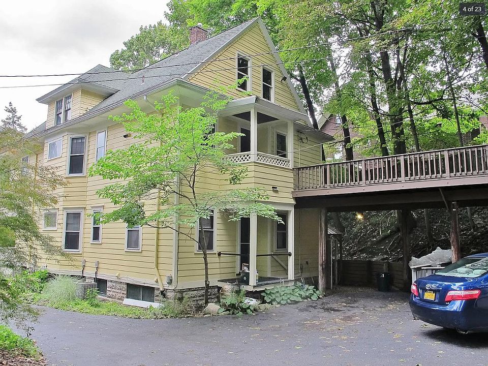 Unit is upstairs and will have use of the deck over the driveway. Deck is accessed off the kitchen.