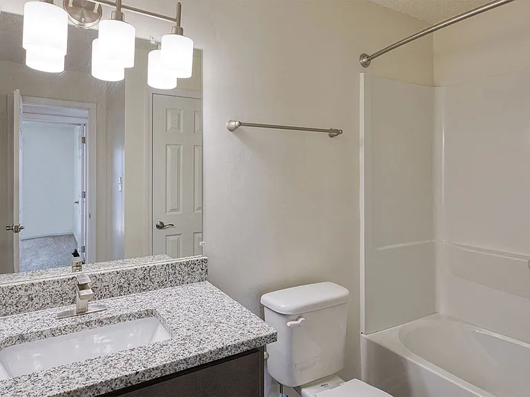 New lighting and vanities in renovated apartments