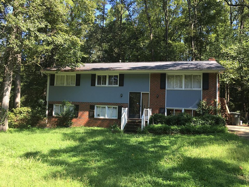 House is located at the end of street adjacent to trail system.