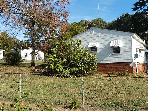 Fig tree on side of house