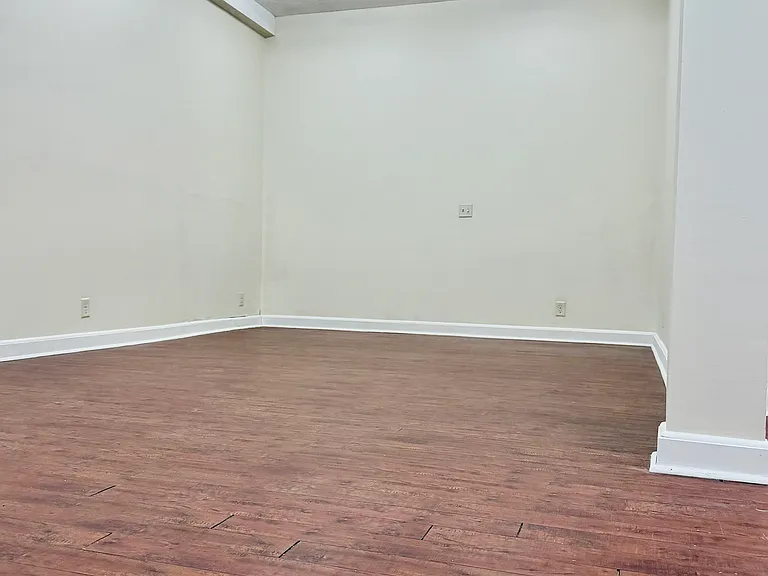 Bedroom 1. much larger than it appears in this pic! super high ceilings.