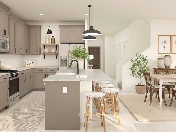 Kitchen with island and pendant lighting