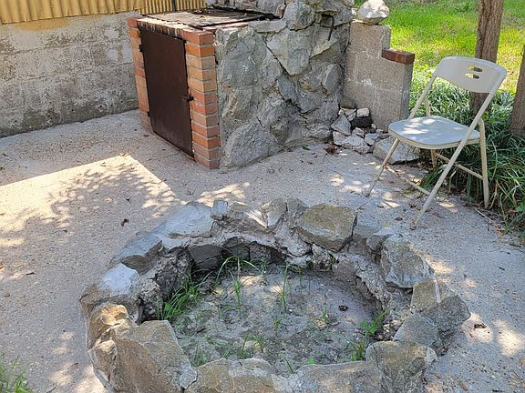Backyard Patio Stone Firepit & Built-in BBQ Grill
