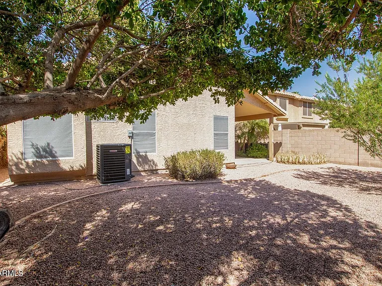 low maintenance back yard with nice shade trees and Privacy.