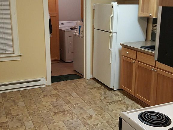 Kitchen with laundry/mud room beyond