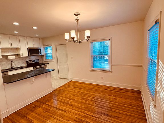 Open Dining Room and Kitchen with Bar Counter