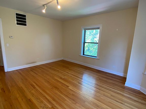 Living room has space for small dining table