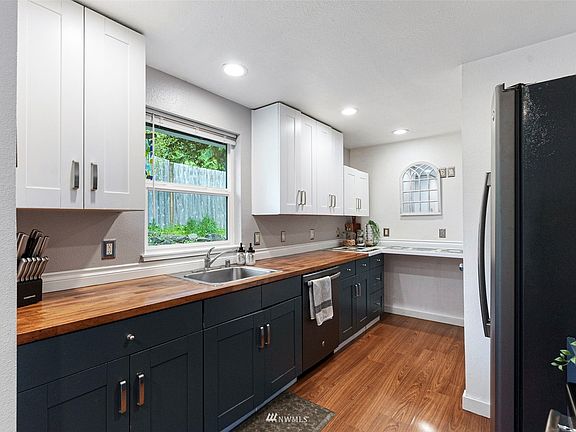 Updated kitchen with natural views out the kitchen window