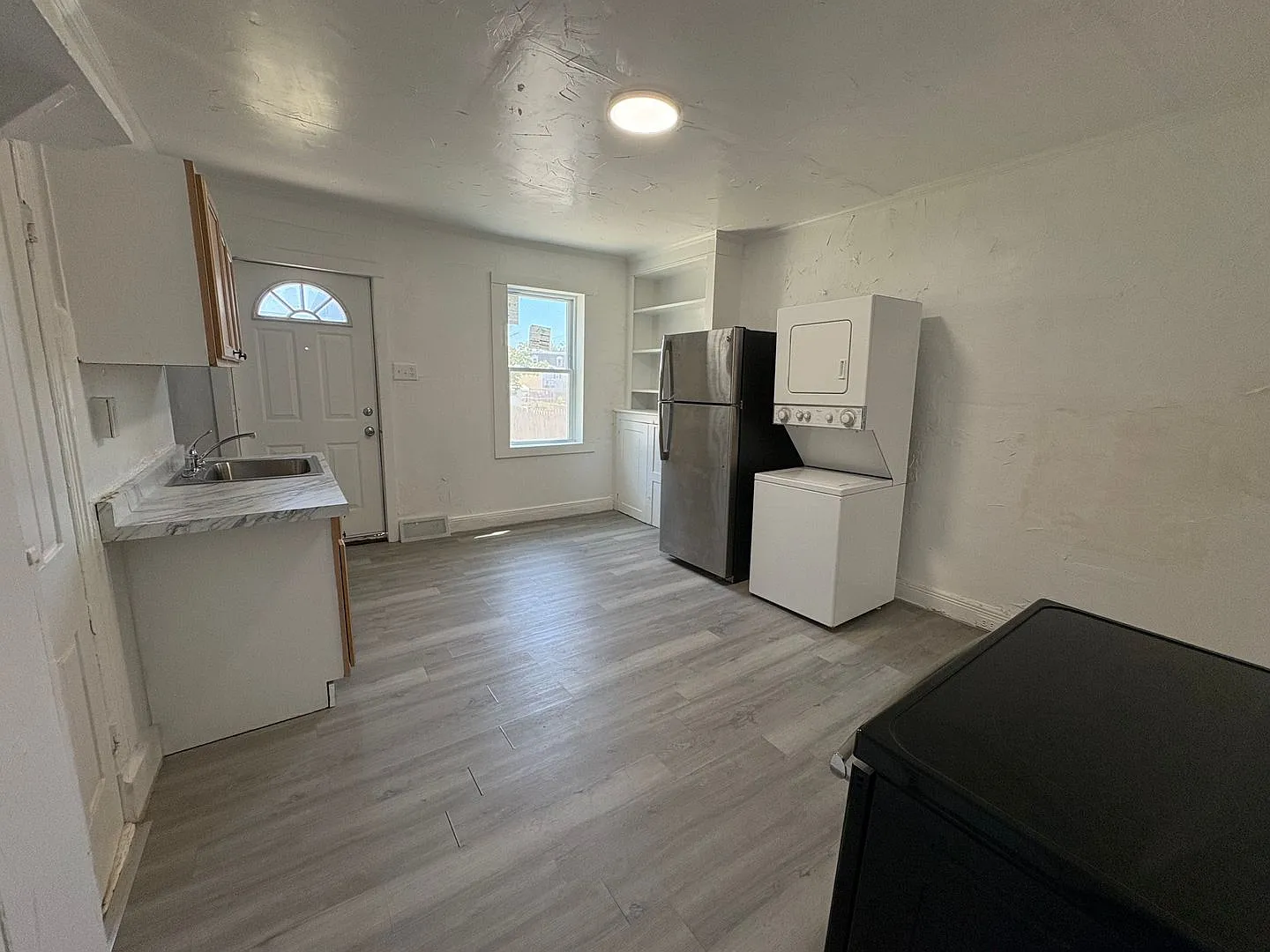 Newly Renovated Two-Bedroom, One Bathroom Row Home - Move-In Special! Get $700 Off Your Second Mo... — Photo 3