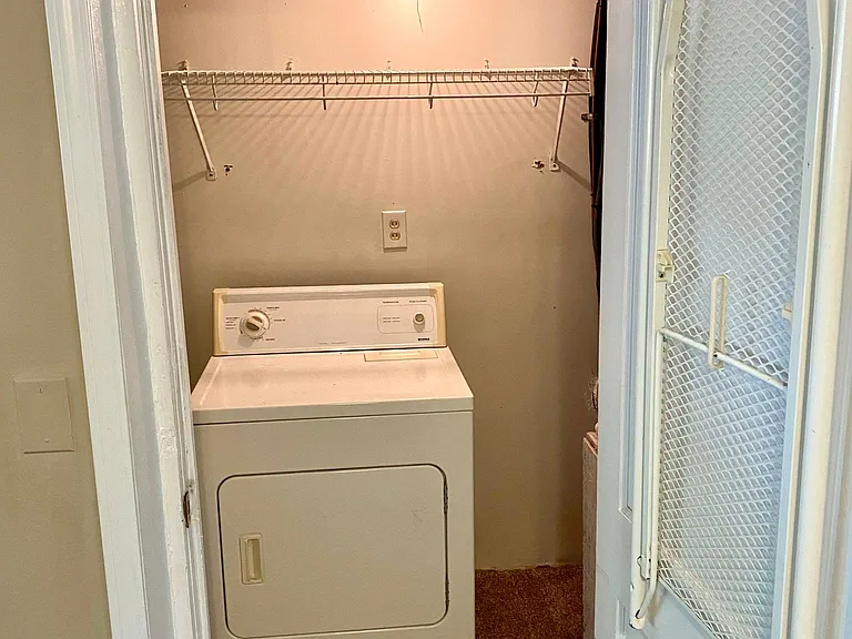 Laundry room and storage area.