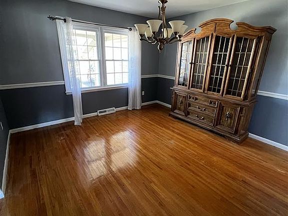 Dining room, with wooden china cabinet