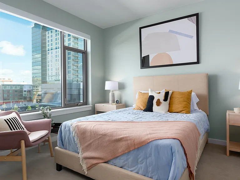 Soft light, modern design, and thoughtful details make this Eleven33 bedroom the perfect place to start and end your day comfortable, refined, and unmistakably Oak Park.
