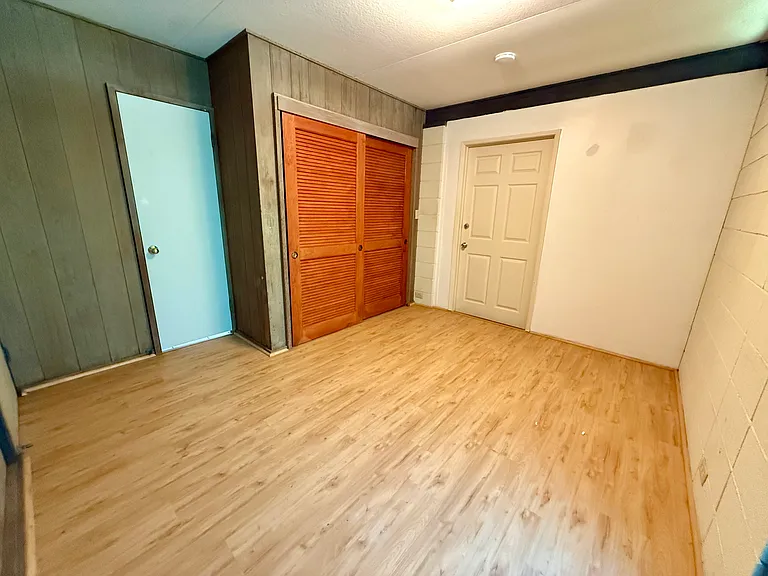 Bedroom 2 with new flooring.