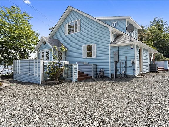 A look at the northern facing side of the home. There are several entrances in and out of the home. 