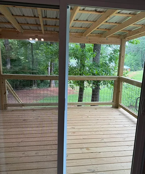 Brand New covered deck, before trees were trimmed to properly view the lake!