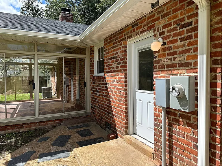 Rear entrance to laundry/mudroom.