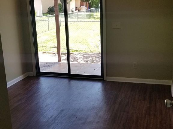 First floor bedroom with patio access