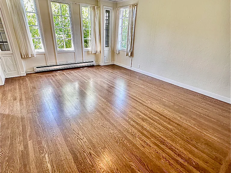 Unit #303-similar living room with gorgeous hardwood floors!