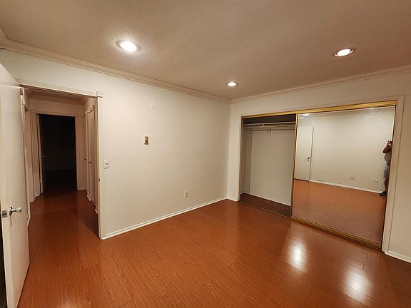 Another view of second bedroom with large closet space