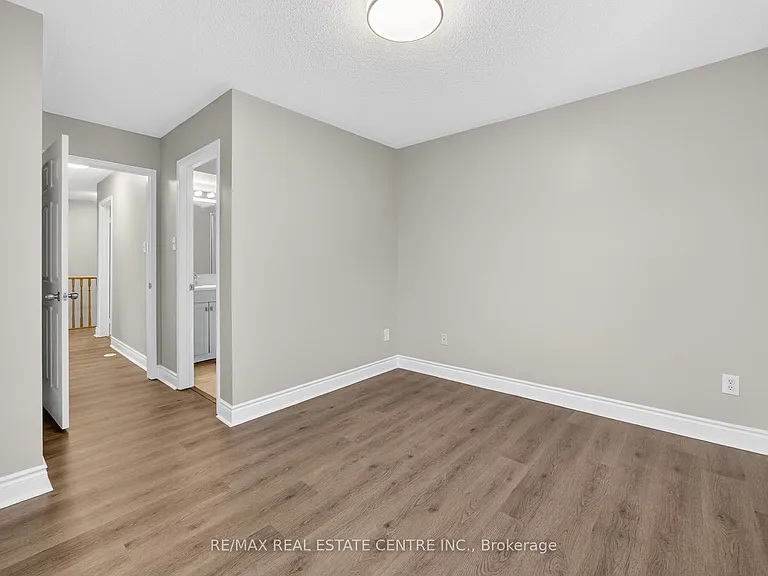 5035 Oscar Peterson Blvd #105 — Photo 32