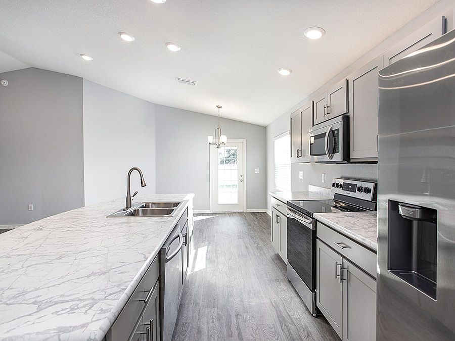Brand-new 4-bedroom home for sale in Eagle Lake, Florida - Photo showcases a home with similar finis