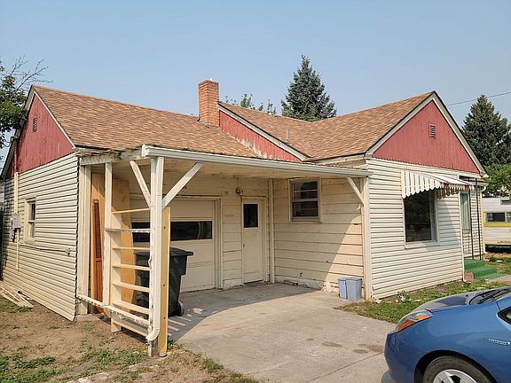Carport view of home